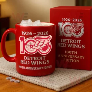 A red mug with the Detroit Red Wings 100th Anniversary logo and matching box beside it!```