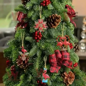 Christmas tree decorated with pink flamingo ornaments and festive ribbons.