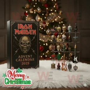 An Iron Maiden 2025 advent calendar with collectible figures and guitars in front of a Christmas tree.