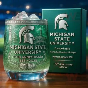 Michigan State University 170th Anniversary commemorative etched glass with a matching box in a vibrant stadium-like setting.