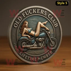 A biker coin with a skull in a cap surrounded by wrenches and text Old Fuckers Club 100 Percent Attitude No Rules Since 1979.