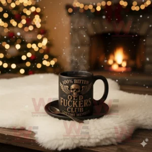 Old Fuckers Club Lifetime Member coffee mug with a skull design, set in front of a fireplace and Christmas tree.