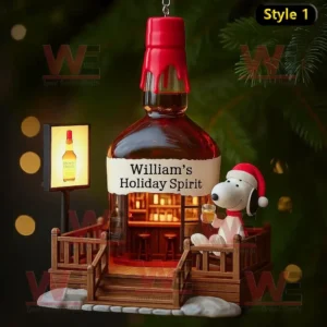Snoopy sitting beside a whiskey bottle ornament labeled William’s Holiday Spirit with warm lights inside.