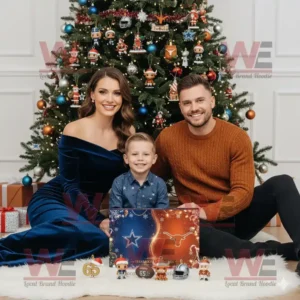 Family sitting by Christmas tree with Texas Football Legends Advent Calendar 2025.