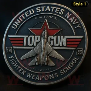 A metallic Top Gun coin showing an F14 Tomcat and United States Navy Fighter Weapons School text.