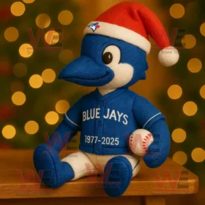 Toronto Blue Jays plush doll wearing Santa hat and jersey with 1977 to 2025 written holding baseball in front of Christmas lights!