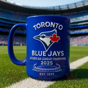 A blue mug with the Toronto Blue Jays logo and text American League Champions 2025 on a baseball field.