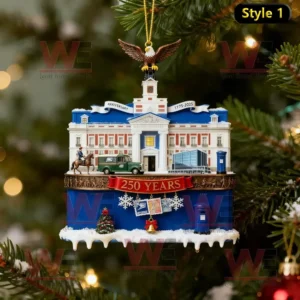 USPS 250th Anniversary ornament shaped like a post office building hanging on a Christmas tree.