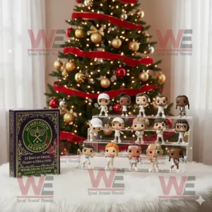 Mini tennis figures from the Wimbledon Legends Advent Calendar displayed on a table in front of a Christmas tree.