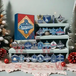 A festive arrangement of Dodgers championship ornaments displayed on tiered shelves next to a branded champions box with holiday decorations around the scene!
