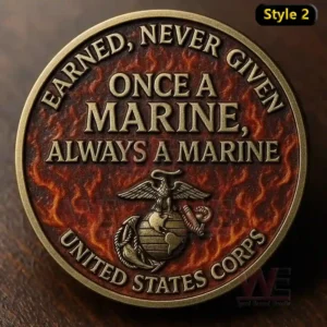 A round coin showing engraved text a marine emblem and intense flame patterns.```
