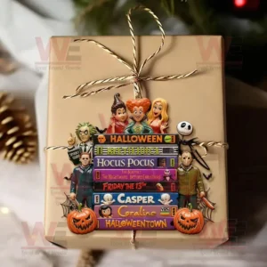 Halloween ornament featuring famous spooky movie characters with stacked classic VHS tapes and pumpkin decorations on a wrapped gift box!