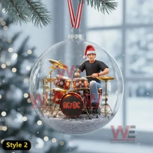 AC/DC Rock Band Christmas Ornament 9 A clear ornament contains a miniature drummer figure positioned at a drum kit within a snowy display!