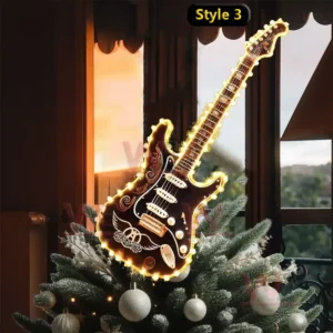 Aerosmith Band Christmas Tree Topper 8 Christmas tree with an electric guitar topper glowing near a window at sunset.