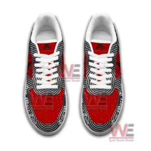 Overhead image of patterned red and black sneakers displaying their detailed graphic layout!