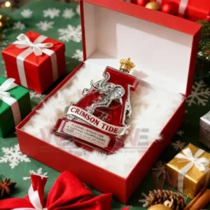 Alabama Crimson Tide National Champions Whiskey Bottle 9 The image shows an Alabama Crimson Tide themed bottle held beside its red product box placed on a wooden bar surface!