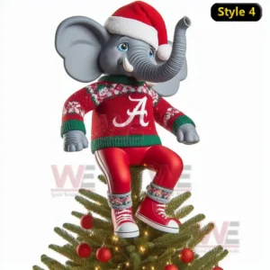 Elephant mascot in Christmas sweater and Santa hat sitting on top of a glowing Christmas tree.