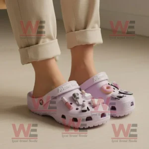 Ariana Grande Crocs Clogs with Charms 7 Ariana Grande themed lavender Crocs with pink and white charms on bright floor!