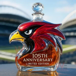 A detailed cardinal head bottle displayed on a smooth surface with a large stadium visible behind it!
