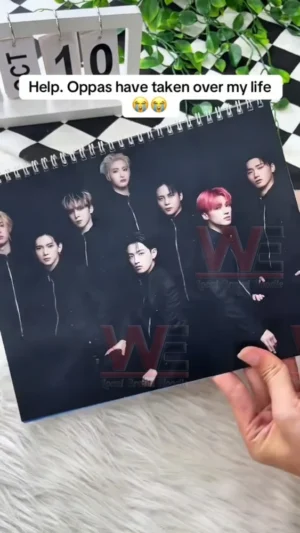 ATEEZ 2026 calendar page featuring the group in dark modern fashion against a minimalist background!