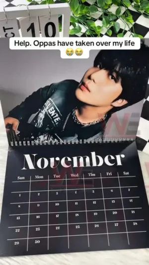 ATEEZ 2026 calendar November page with a portrait of one member in black attire and silver accessories!