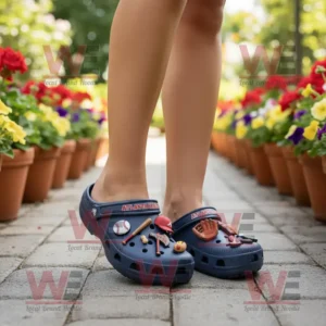 Atlanta Braves MLB Crocs Clogs With Charms 7 Atlanta Braves navy Crocs with baseball charms worn on garden path with flowers!