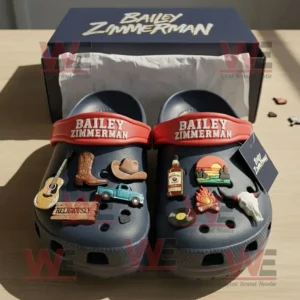 Bailey Zimmerman Crocs Clogs with Charms 7 Bailey Zimmerman Crocs shown with red straps and country-style charms beside the official box on a wooden surface under natural light!