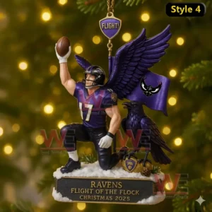 A Baltimore Ravens themed Christmas ornament of a number 17 player with wings kneeling on snow while lifting a football beside a raven and purple flag.