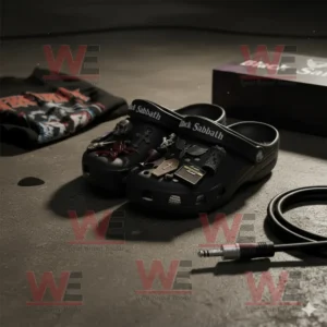 Black Sabbath Crocs Clogs with Charms 6 Black Crocs with Black Sabbath charms on a dark stage floor beside music gear.