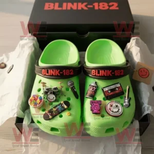 Blink 182 Crocs Clogs with Charms 7 Neon green Blink-182 Crocs with rock charms inside an open branded box.