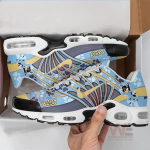 A pair of Bluey-themed sneakers in a shoe box, showing off the playful design.