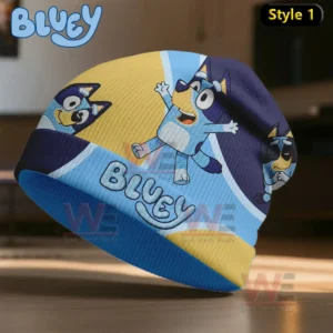 Blue and yellow beanie displaying multiple playful illustrations of a blue cartoon dog.