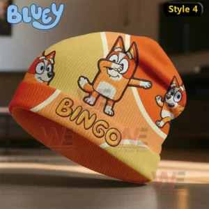 Orange and yellow beanie with playful illustrations of an orange cartoon dog.