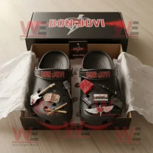 Bon Jovi Crocs Clogs with Charms 7 Bon Jovi black and red Crocs arranged neatly in an open box featuring charms that symbolize the iconic rock band’s instruments and style!