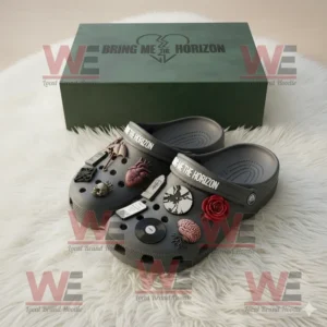 Bring Me the Horizon Crocs Clogs with Charms 6 Bring Me The Horizon Crocs featuring dark themed charms and logo box captured in soft light on a cozy white rug!