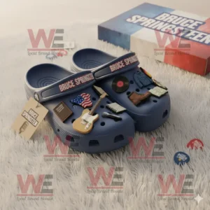 Bruce Springsteen Crocs Clogs with Charms 6 Bruce Springsteen Crocs featuring patriotic and musical charms photographed in soft lighting near the official themed box!