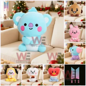 Group of colorful plush characters displayed on a sofa with Christmas decorations in the background!