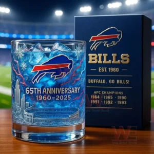 Buffalo Bills 1960-2026 65th Anniversary Whiskey Glass 5 A close up depiction of a Buffalo Bills anniversary glass with ice in front of a matching box under stadium lights!```
