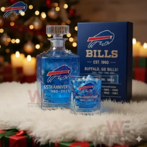 A blue themed anniversary bottle and glass set with team branding placed before a holiday backdrop with lights and wrapped gifts!