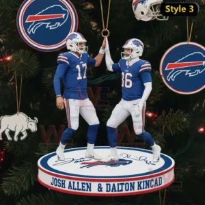 Two blue uniformed football figures high fiving on a round ornament base labeled Style three!