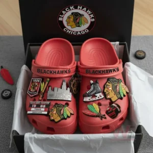 Chicago Blackhawks Crocs Crocband Clogs 5 Chicago Blackhawks Crocs in a box with team-related charms.