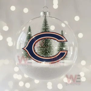 A clear Christmas ornament containing snow and trees with a large Chicago Bears logo on the front.