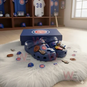 Chicago Cubs Crocs Crocband Clogs With Charms 6 Blue Chicago Cubs clogs in front of a team box on a white furry rug with baseball charms around!