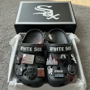 Chicago White Sox Crocs with themed charms such as a baseball glove and logo inside a black box.