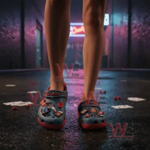 Alt text: Chucky-themed crocs with charms, including a knife, doll, and teddy bear, on a wet street at night.