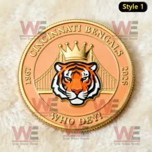 Cincinnati Bengals commemorative coin with crowned tiger head logo bridge illustration gold rim and orange enamel background.