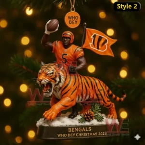 A Cincinnati Bengals Christmas ornament showing a number 5 player beside a roaring tiger with a Who Dey tag and flag behind.