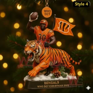 A Cincinnati Bengals Christmas ornament of a number 30 player holding a football beside a tiger with a Who Dey tag and team flag.
