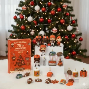 Cleveland Browns Advent Calendar 2025 6 A group of Cleveland Browns figurines and ornaments displayed with an advent calendar box in front of a red and white decorated Christmas tree.