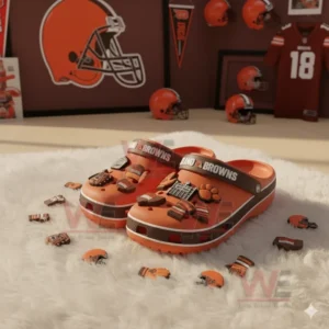 Cleveland Browns Crocs Crocband Clogs With Charms 6 Orange Cleveland Browns clogs with football charms displayed in a room full of team memorabilia!